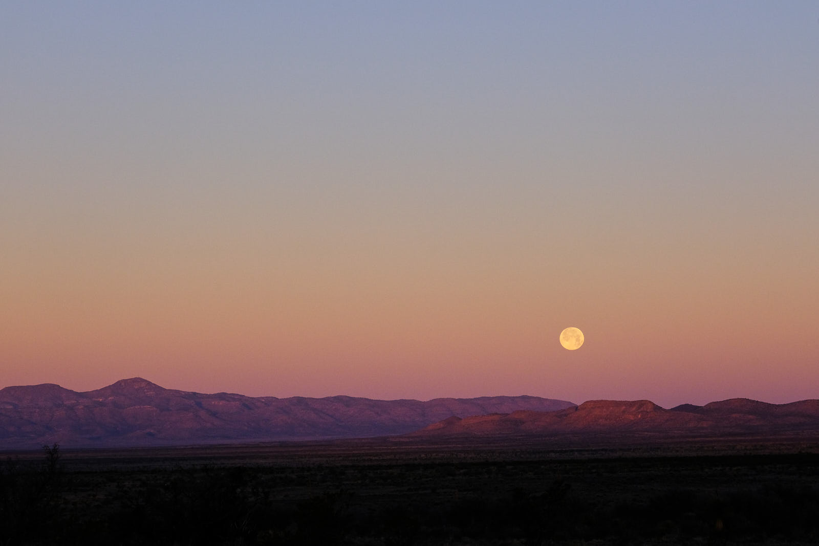 O moon above the mountains’ rim, 